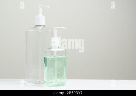 Two hand sanitizer in plastic bottle on white background Stock Photo