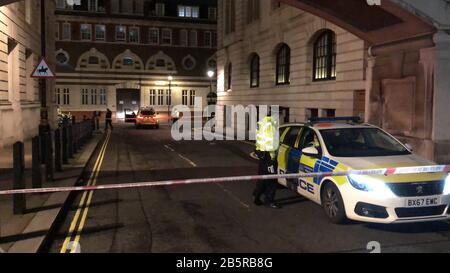 BEST QUALITY AVAILABLE A picture of a police cordon in Westminster after a man brandishing knives was shot dead by police on Sunday night. Stock Photo