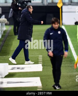 Turin, Italy. 8th Mar, 2020. Juventus's head coach Maurizio Sarri (L) reacts during the Italian Serie A soccer match between Juventus and Inter Milan in Turin, Italy, March 8, 2020. Credit: Str/Xinhua/Alamy Live News Stock Photo