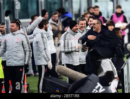 Turin, Italy. 8th Mar, 2020. Juventus's head coach Maurizio Sarri (R) celebrates after winning the Italian Serie A soccer match between Juventus and Inter Milan in Turin, Italy, March 8, 2020. Credit: Str/Xinhua/Alamy Live News Stock Photo