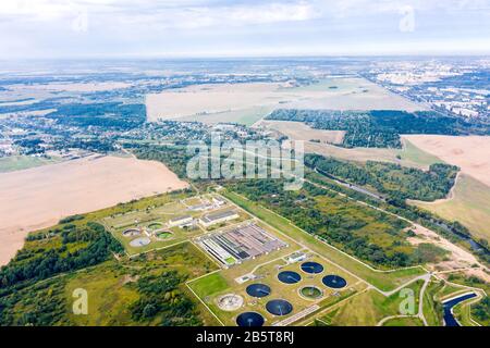 aerial panoramic view of modern urban sewage water treatment plant