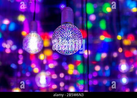 Red blue neon garlands of bokeh lights and reflections. Stock Photo