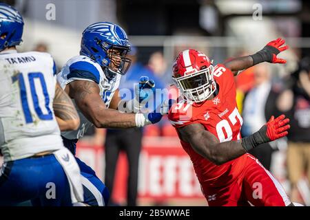 Feb 23, 2020: St. Louis Battlehawks quarterback Jordan Ta'Amu (10) gets the  pass away before he can be sacked in the end zone by NY Guardians  linebacker Ryan Mueller (44) in a