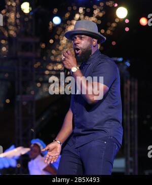 PORT OF SPAIN, TRINIDAD - FEB 23: Soca recording artist Bunji Garlin performs at Dimanche Gra in the Queen’s Park Savannah as part of Trinidad Carniva Stock Photo