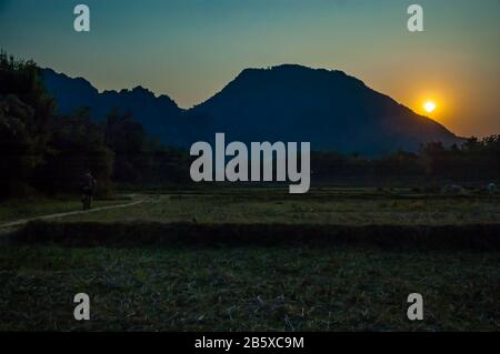 The limestone karst scenery in the countryside around Vang Vieng, Laos. Stock Photo