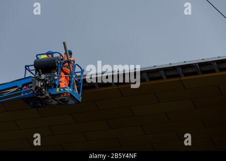 Working at height at Glasgow Queen Street Station ahead of the completion of it's upgrade this year. Taken in March 2020 Stock Photo