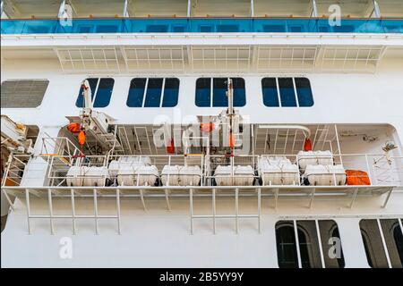 Inflatable liferafts in hard-shelled canisters on a passenger liner Stock Photo