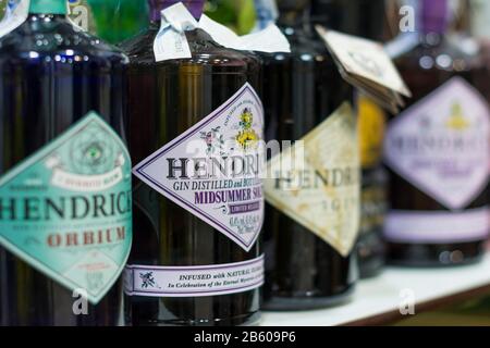 Valencia, Spain - February 22, 2020: Shelving in a pub with bottles of Hendricks gin, Scottish brand produced by William Grant & Sons Stock Photo