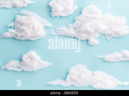 White cotton wool clouds on blue background Stock Photo - Alamy