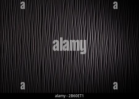 Wooden black undulating surface texture. Close up Stock Photo