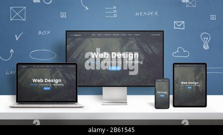 Web design studio web site responsive design presentation on computer display, laptop, smart phone and tablet. Blue wall with web design concept eleme Stock Photo