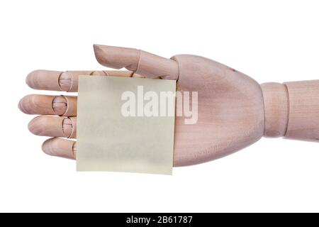 Wooden hand prosthesis holds sticker frame for an inscription. On a white background. Stock Photo