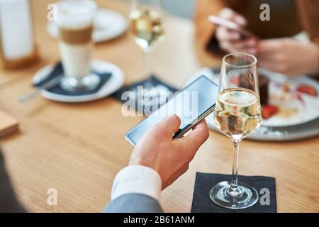 Business people Having Meeting In Cafe Stock Photo