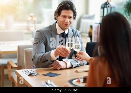 Business people Having Meeting In Cafe Stock Photo