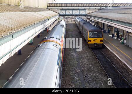 Trains at platform in St David's railway station, Exeter, Devon, England, UK -  British Rail Class 143 diesel multiple unit, part of the Pacer family Stock Photo