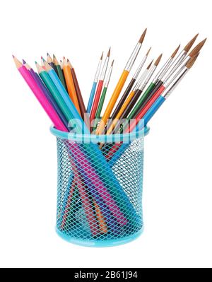 In your basket set of pencils and brushes for painting. On a white background. Stock Photo