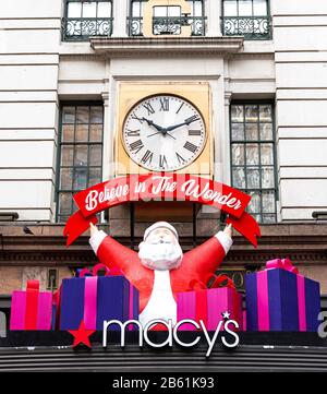 New York city, New York, USA - 26 December 2019: Santa Claus decoration on top of the entrance of MAcy's herald avenue store the day after Christmas. Stock Photo