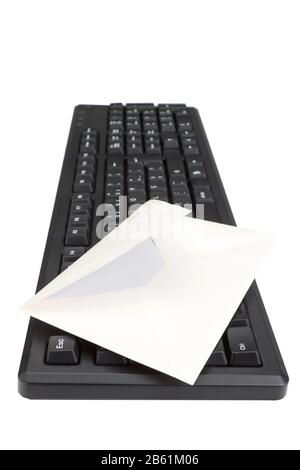 Computer keyboard and envelope for mail. On a white background. Stock Photo
