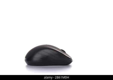 Ergonomic manipulator computer mouse isolated on a white background. Black computer mouse on a white background with place for text. Stock Photo