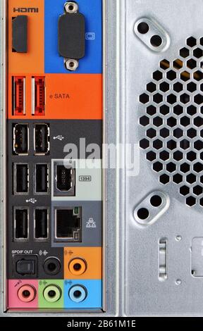 The back of a desktop computer and peripherals. Close-up. Stock Photo