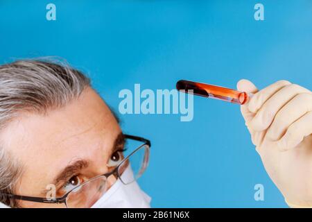 Laboratory technician vacuum test tube blood for testing in laboratory examination of a blood sample Stock Photo