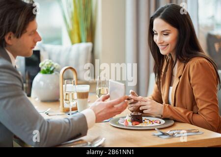 Business people Having Meeting In Cafe Stock Photo