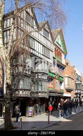 Historic Tudor buildings in High Street, Exeter city centre, Devon, England, UK Stock Photo