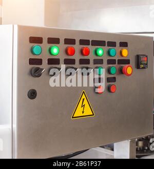 Production line control panel. Multi-colored buttons. Manufacturing and ...