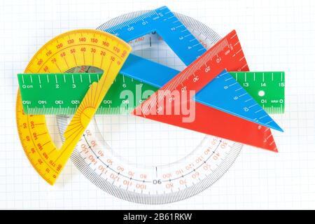 A set of colored triangles and lines protractors for drawing. On a white background. Stock Photo