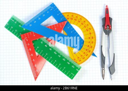 Set of multicolored lines of triangles, protractors and Caliper. On a white background. Stock Photo