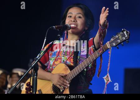 Chilean singer and activist Sara Curruchich performs live on stage during the Tiempo de Mujeres Music Festival at Zocalo in Mexico City. Stock Photo