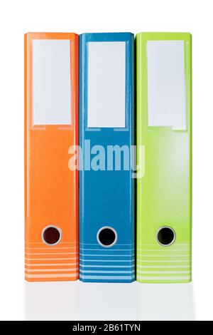 Three colored folders for office clerical. On a white background. Stock Photo