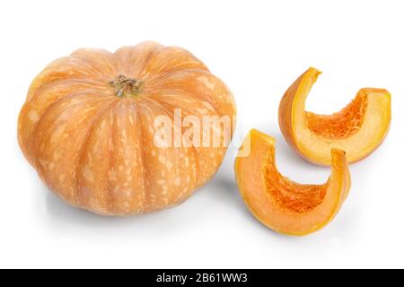 Cut pieces of pumpkin soup slices. On a white background. Stock Photo