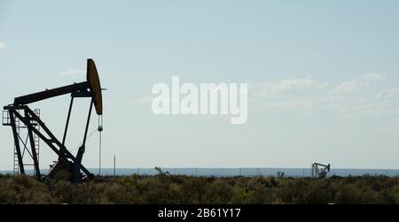 Vaca muerta field. Oil pump jack pumping crude out of the ground in Neuquen, Argentina Stock Photo