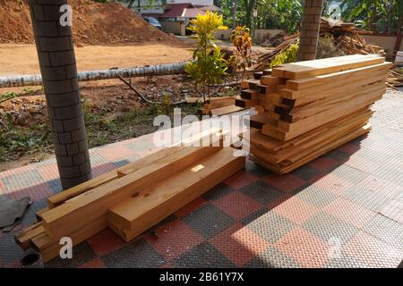 Furniture, doors, windows frame, and tables at factory. Wood cutting for making a door frame, window frame for using in building houses, business. Cut Stock Photo