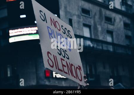 Poster in the 8M protest that says 'If you are not noise you are silence' Stock Photo