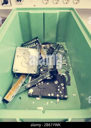 Electronic trash with various destroyed computer components. Stock Photo