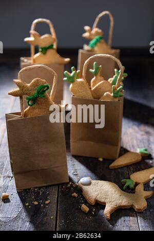 Shortbread cookies in the shape of bunnies and carrots.Easter time.Low fat sweets.Delicious food and drink Stock Photo
