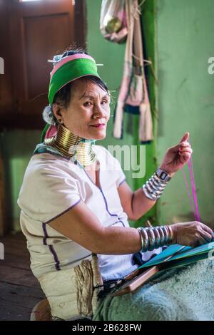 Portrait of the Long neck woman in their house, Inle lake, Myanmar, Asia. Stock Photo