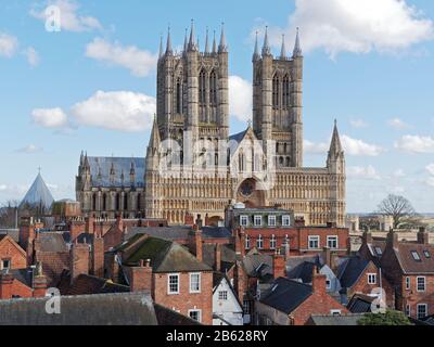 The splendid west front and towers of Lincoln Cathedral seen from the walls of Lincoln Castle. Stock Photo