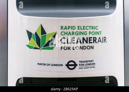 Cleaner Air for London sign on a BP Chargemaster rapid electric charging point at a kerbside in south London. Stock Photo