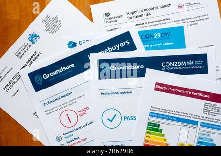 Some of the searches, enquiries and reports involved when buying a house. Stock Photo
