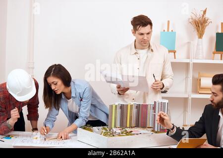 professional architecs and designers making up eco housing in a beautiful location.close up photo Stock Photo