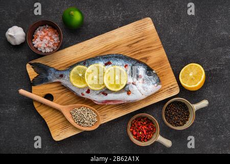Overhead view of gilt head bream with spice prepared for cooking Stock Photo