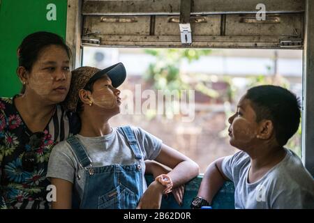 Local people in the train, Yangon, Myanmar, Asia. Stock Photo