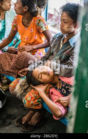 Local people in the train, Yangon, Myanmar, Asia. Stock Photo