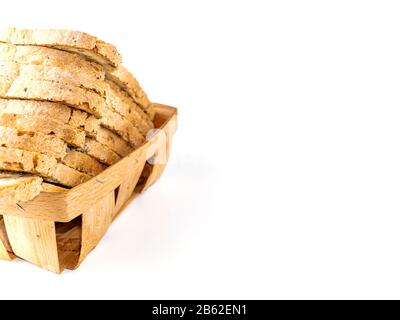 White bread in a wooden bread box on a white background. Stock Photo