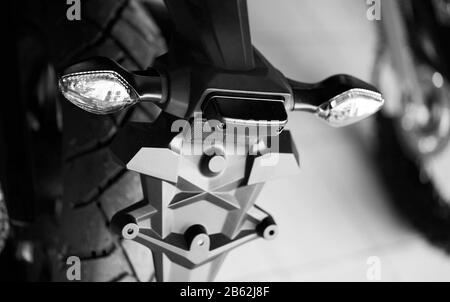 Close up of the rear of a brand new clasic motorcycle, soft focus. Stock Photo