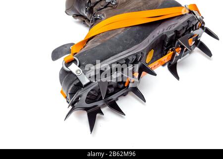 leather climbing boots with crampons, isolated on white background Stock Photo