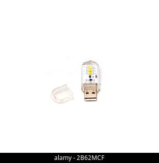 USB memory stick in transparent body isolated on white background Stock Photo